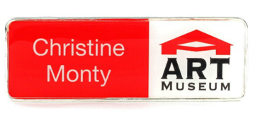 A plastic executive name badge with the leyend: "Christine Monty"